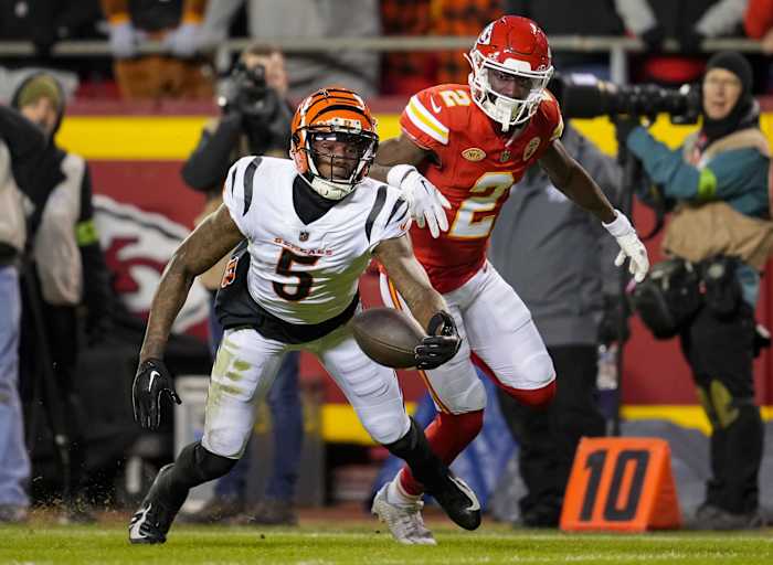 Dec 31, 2023; Kansas City, Missouri, USA; Cincinnati Bengals wide receiver Tee Higgins (5) is unable to make the catch as Kansas City Chiefs cornerback Joshua Williams (2) defends during the second half at GEHA Field at Arrowhead Stadium.